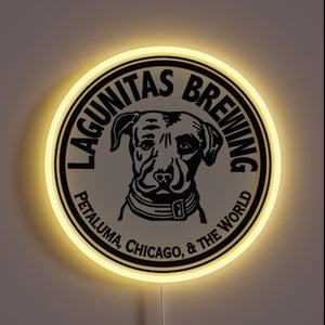 **Alt Text:** Lagunitas Brewing neon sign with dog logo and yellow glow.