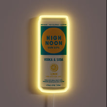 Load image into Gallery viewer, Brightly lit customneon sign shaped like a High Noon Sun Sips vodka soda can in lemon flavor, glowing with a soft yellow border around the can’s vibrant turquoise and yellow label.