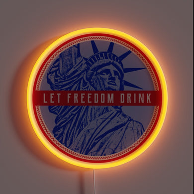 Neon Sign: Vibrant RGB Letters Declare 'Let Freedom Drink' Statement