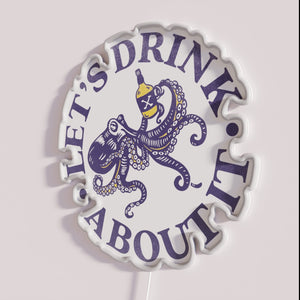 Colorful octopus themed neon bar decoration with funny motivational quote
