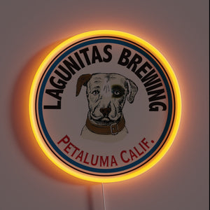 This neon sign showcases the iconic Lagunitas Brewing logo featuring its trademark dog illustration, proudly representing Petaluma, California — a must-have for fans of craft beer and West Coast brews.