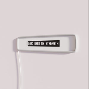Vibrant RGB neon sign featuring 'Lord Beer Me Strength' quote.