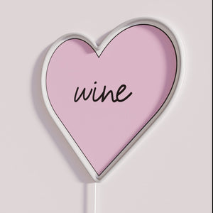 Vibrant wine lover's home decor neon sign with colorful LED accents.