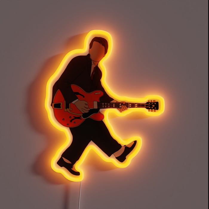 Neon sign of a faceless guitarist in a suit, inspired by Marty McFly's iconic performance with a glowing orange outline.