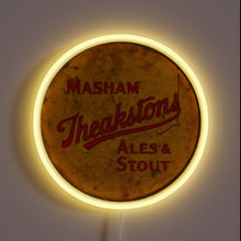 Load image into Gallery viewer, Vibrant neon sign featuring iconic Masham Theakstons brewery logo in triangles.