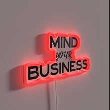 Load image into Gallery viewer, Inspiring sober living with bright vibrant &quot;Mind Your Business&quot; neon signage.