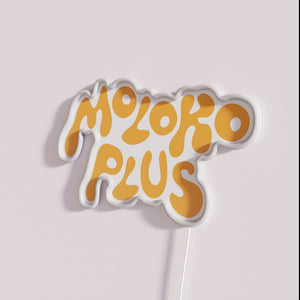 Brighten up your space with vibrant Moloko Plus orange signage