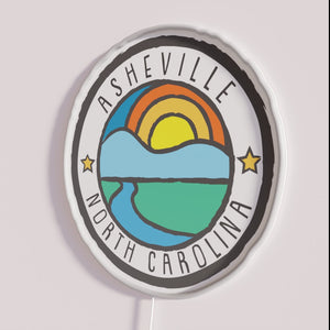 Vibrant mountain-inspired RGB neon sign for Asheville's eclectic downtown atmosphere.