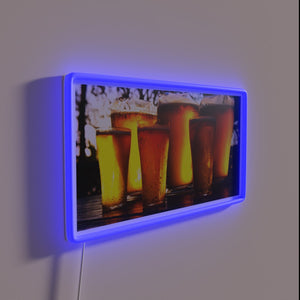 Bright neon sign featuring 6 friends in vibrant colorful portraits