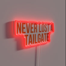 Load image into Gallery viewer, Vibrant Neon Wall Sign Reads Never Lost a Tailgate Orange