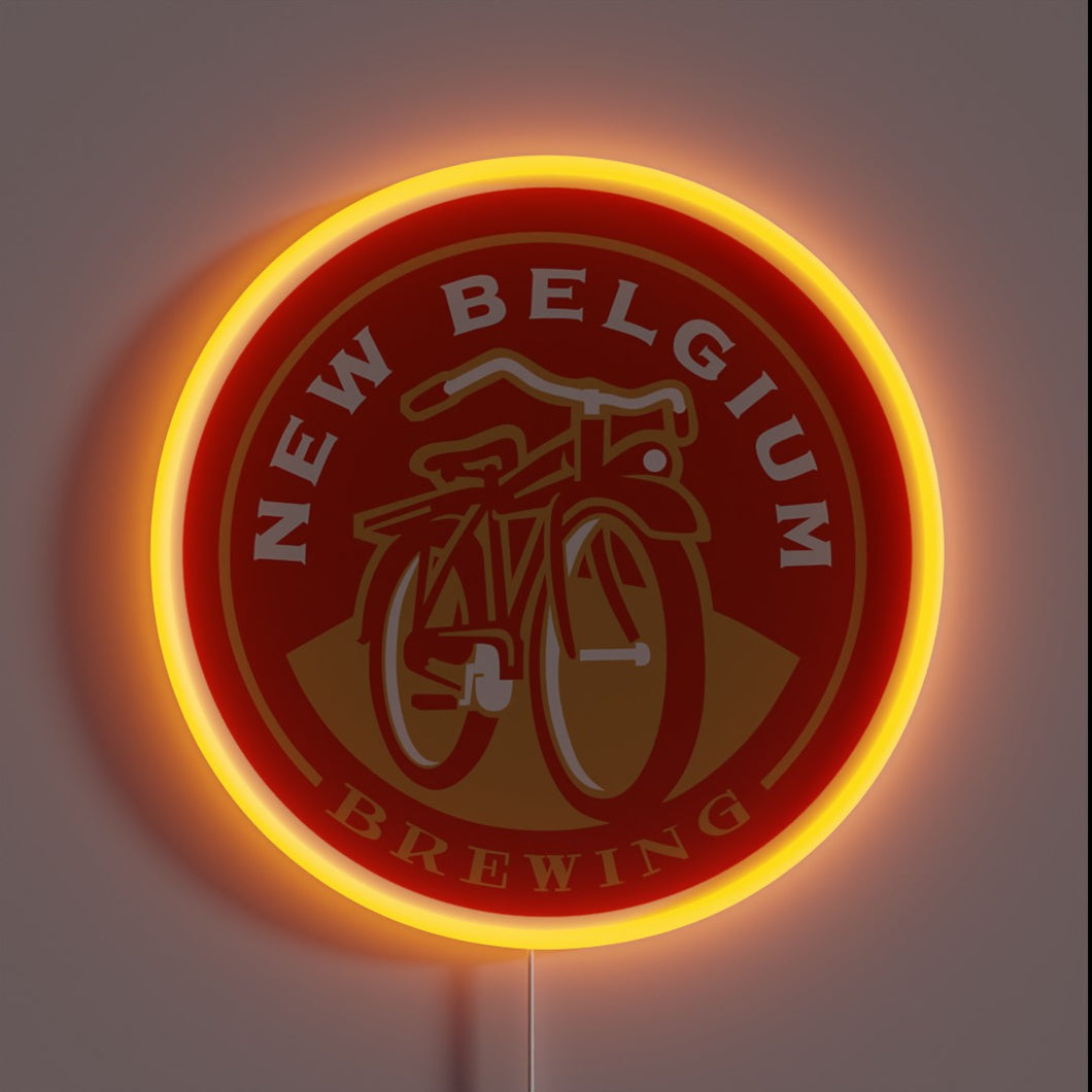This glowing neon sign features the iconic New Belgium Brewing logo — a red cruiser bicycle set against a warm amber hue — making it a perfect tribute for craft beer lovers and brewery aficionados alike.