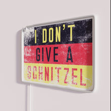 Load image into Gallery viewer, Colorful neon sign celebrating German culture with humorous food humor.