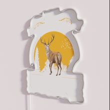 Load image into Gallery viewer, Traditional German themed Oktoberfest decor with deer and lederhosen design.