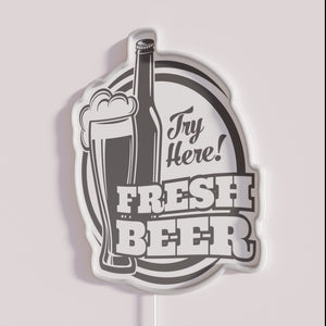 Vibrant Oktoberfest themed neon quote decor with beer designs illuminated