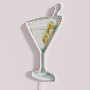 Vibrant neon cocktail bar decor featuring olive martini signs