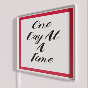 Vibrant RGB Neon Sign with Uplifting Inspirational Quote 'One Day' Design