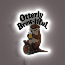 Load image into Gallery viewer, Cute and quirky otter-themed neon bar decoration with colorful lighting