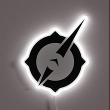 Load image into Gallery viewer, This neon sign features the bold, sharp-edged logo of *Outriders*, illuminated in crisp white — a sleek and powerful homage to the intense, sci-fi world of the game. Perfect for any gaming setup or fan cave.