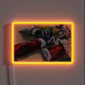 Bright and colorful paint tubes in radiant RGB neon effect