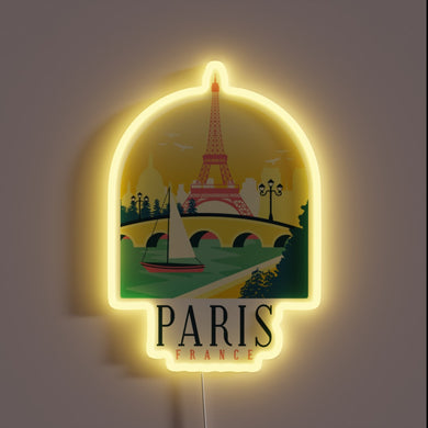A glowing tribute to Paris — the Eiffel Tower, sailboats, and a romantic skyline wrapped in neon light.