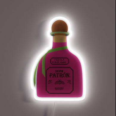 Eye-catching pink neon sign featuring a patron bottle in vibrant colors.
