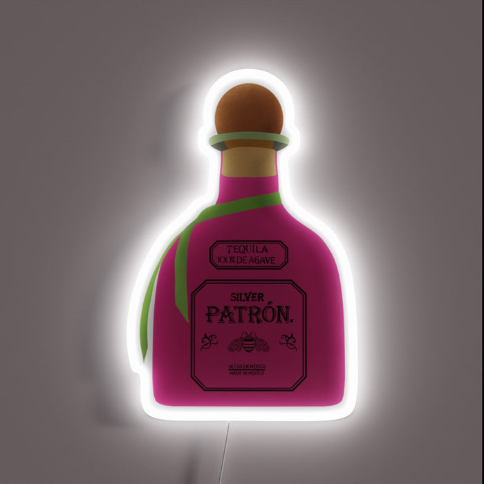 Eye-catching pink neon sign featuring a patron bottle in vibrant colors.