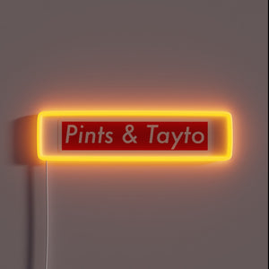 Vibrant pints and tattoo logo illuminated RGB neon bar decoration.