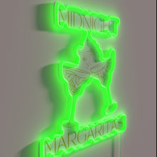 Load image into Gallery viewer, Whimsical glow of midnight magic in a glass