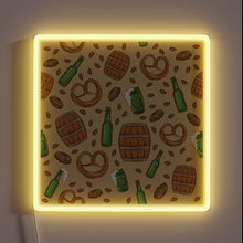 Load image into Gallery viewer, Vibrant Oktoberfest Celebration Sign with Neon Pretzels and Beer Icons