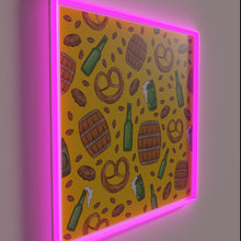 Load image into Gallery viewer, Vibrant yellow neon Oktoberfest design featuring pretzels and beer graphics.