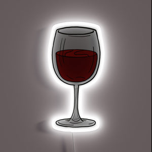 Boldly illuminated wine glass decor in vibrant red and blue glow