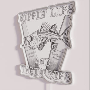 Eye-catching vibrant RGB neon sign with Rippin Lips logo design