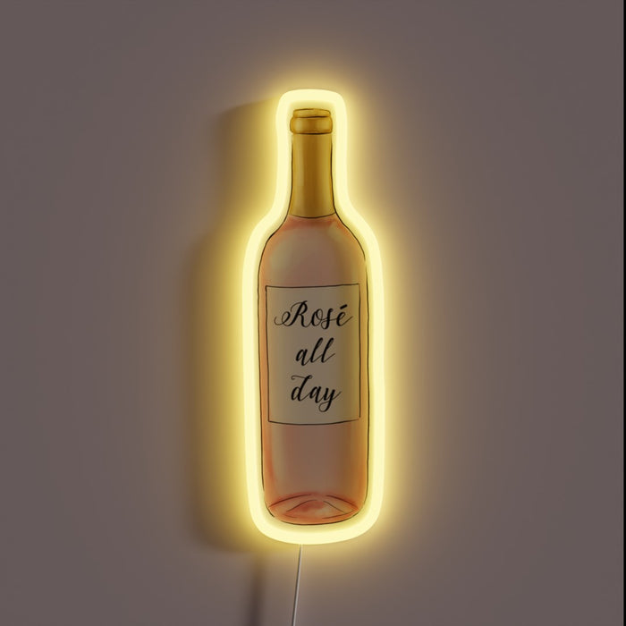 Neon sign in the shape of a rosé wine bottle with the text 