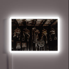 Load image into Gallery viewer, Vibrant LED saddle-shaped neon light adds Western flair to decor spaces.
