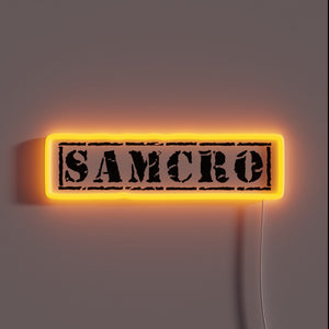 Glowing neon 'SAMCRO' logo in vibrant rainbow RGB colors
