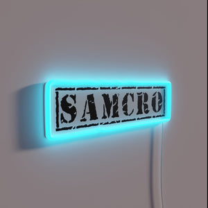 Vibrant SAMCRO logo illuminated in multicolor LED neon signage