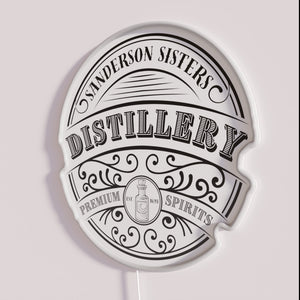 Add a spooky glow with Sanderson Sisters Distillery neon signage.