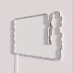 Colorful German-themed neon wall decor with funny schnitzel design quotes.