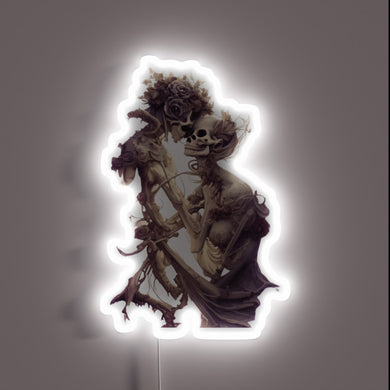 Whimsical Neon Sign Featuring a Lovable Ghostly Skeleton Couple Together.