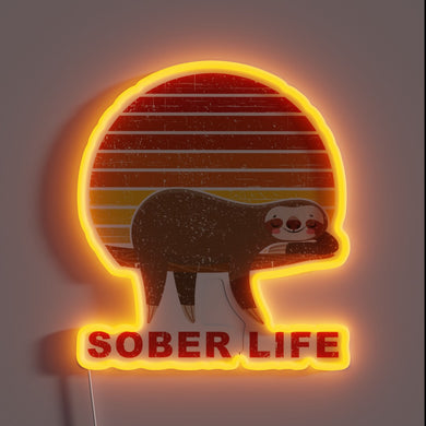 Vibrant neon sign promoting sober lifestyle with retro sunset design.