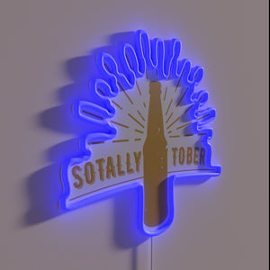 Neon sign reading 'Sotally Tober' in bright RGB colors.