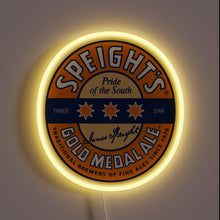 Load image into Gallery viewer, Round neon sign of Speight’s Gold Medal Ale logo with yellow glow.
