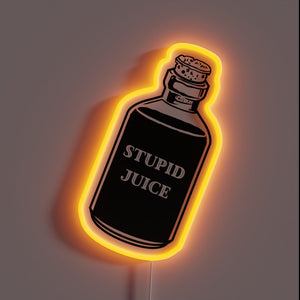 Vibrant Neon Sign Illuminates with Rainbow Colors and Stupid Juice Logo