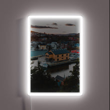 Load image into Gallery viewer, Vibrant sunset backdrop to iconic Quidi Vidi sign, Newfoundland&#39;s neon charm