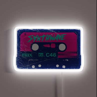Retro cassette tape neon sign with “SYNTHWAVE” in bold — a must-have for vaporwave or retrowave aesthetics.