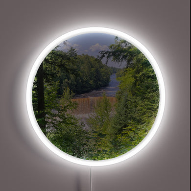 Vibrant digital display of Tahquamenon Falls' majestic Upper and Lower.