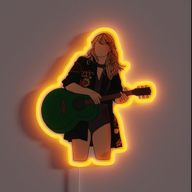 Taylor Swift neon sign with green guitar from Reputation tour, glowing orange outline.