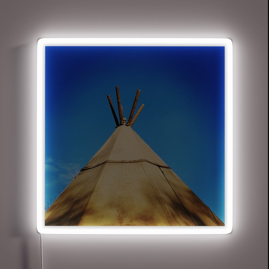 Glowing tribal teepee shape illuminated by vibrant RGB neon lights