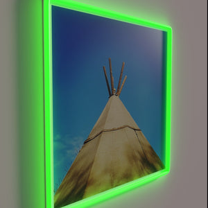 Colorful tribal teepee silhouette with vibrant RGB neon lights glow.