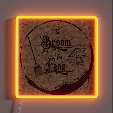 Vintage pub decor with The Broom and Fang logo lighting